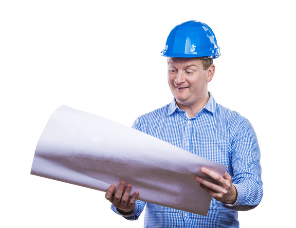 Engineer looking in blueprint - Foto, imagen