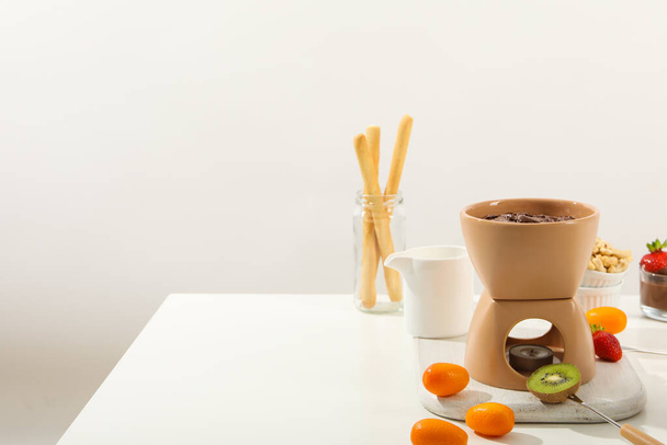 Concept of tasty sweet food - chocolate fondue - Foto, Bild