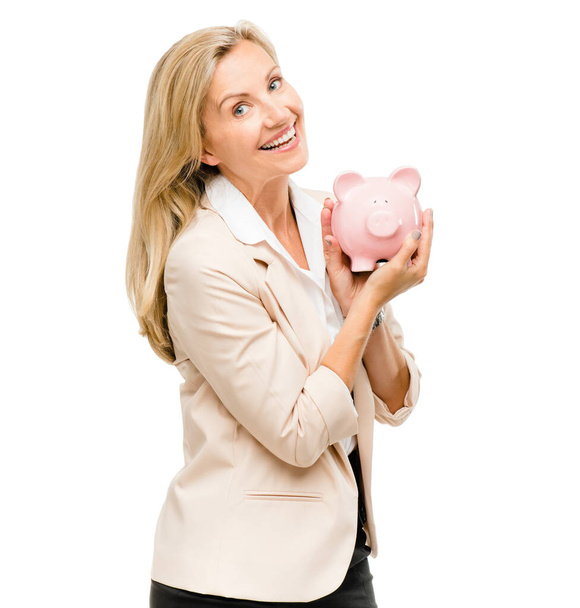 Happy woman, portrait and piggy bank for money investment, savings or loan isolated on a white studio background. Excited female person and piggybank for coins, budget finance or cash on mockup space. - 写真・画像