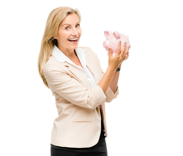 Happy woman, portrait and piggy bank for money savings or investment isolated on a white studio background. Excited female person with piggybank for coins, budget finance or cash on mockup space. - Photo, Image