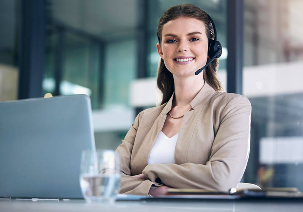 Portrait, call center and woman with a smile, telemarketing and confident with a laptop, headphones and help. Face, female person and consultant with a headset, pc and telemarketing with tech support. - Foto, Imagem