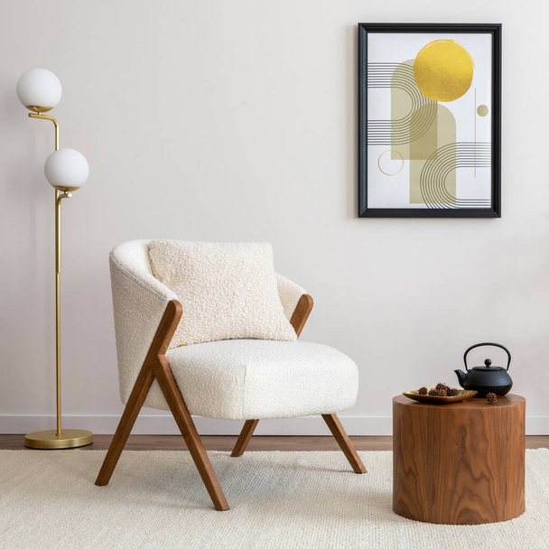 Interior design of harmonized living room with mock up poster, white armchair, lamp, consola and personal accessories. Beige wall. Home decor. Template. - Photo, Image