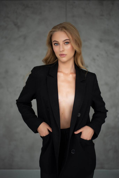 portrait of a beautiful woman in business suit - Photo, Image