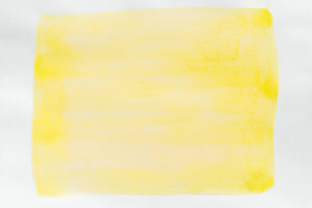 yellow painted watercolor background on white paper texture - Фото, зображення