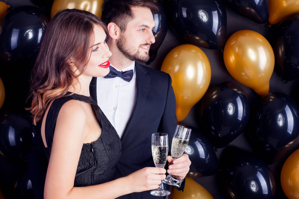 Couple in love with glasses of champagne. - Zdjęcie, obraz