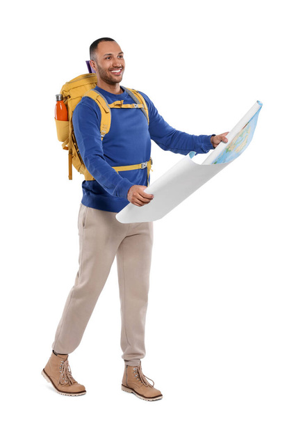 Happy tourist with backpack and map on white background - 写真・画像