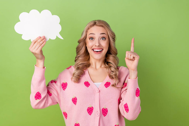 Photo of young girl genius idea blonde hair woman finger point up eureka bubble cloud announce startup isolated on green color background. - Foto, imagen