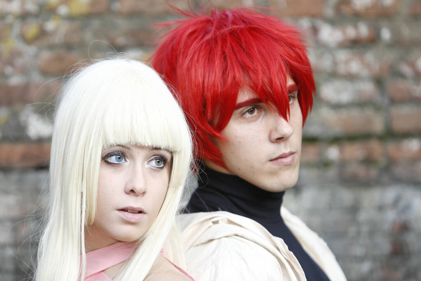 Lucca, Italy - 2018 10 31 : Lucca Comics free cosplay event around city couple of boys with wig. High quality photo - Fotoğraf, Görsel