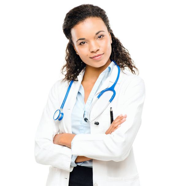 Doctor portrait, woman smile and arms crossed happy from healthcare and wellness career in studio. Young female employee, medical worker and white background and feeling proud and vision from job. - Foto, afbeelding