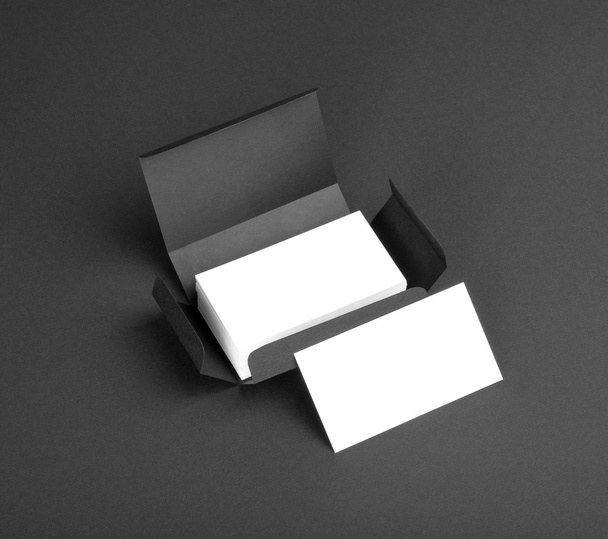 White business cards in the gray box. - Zdjęcie, obraz