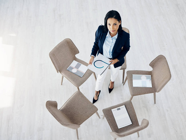 Business woman, waiting room and documents on chair above for meeting or team appointment at the office. Top view of female person or employee in hiring, paperwork or social group at the workplace. - Photo, Image