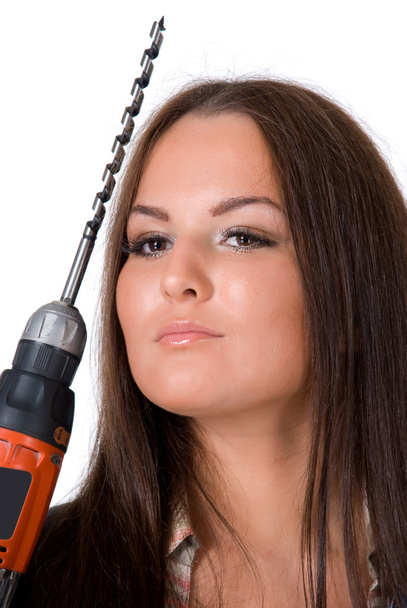 Woman holding a cordless electric drill. - Foto, Imagen