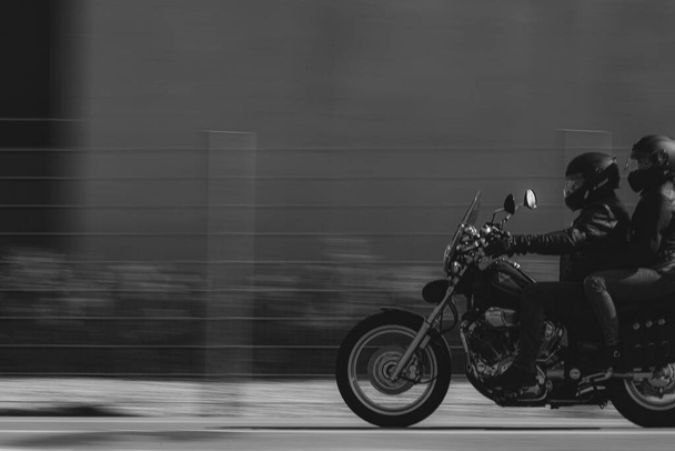 young man riding a motorcycle on the road - Foto, Imagen
