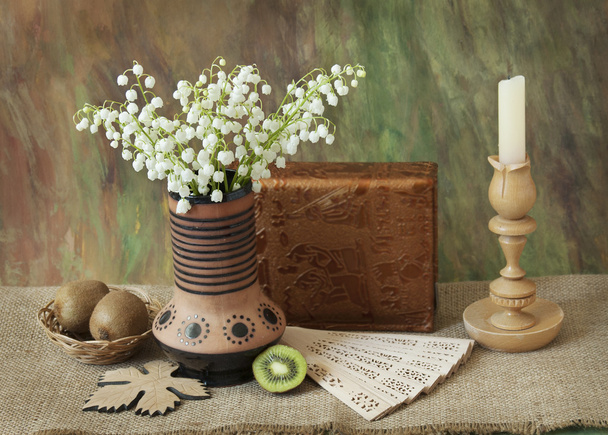Still life with lily-of-valley bunch, books, fruits and fan - Photo, Image