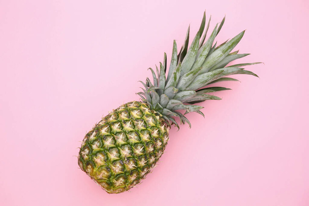 Delicious ripe pineapple on pink background, top view - Фото, изображение