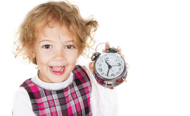 girl with the alarm clock in hand - Foto, Bild