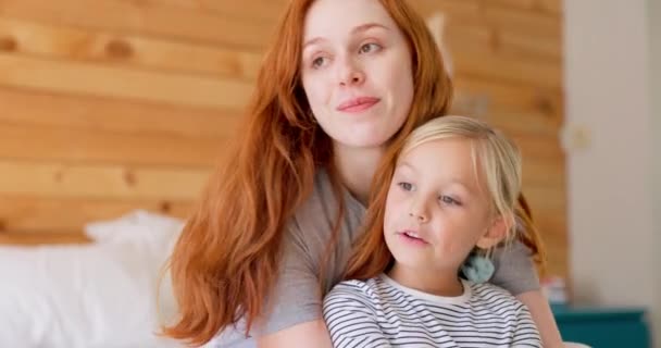 Singing, bonding and mother with her kid in the bedroom for child development, fun or quality time. Happy, smile and young mom playing with her daughter while relaxing together in their family home - Video, Çekim