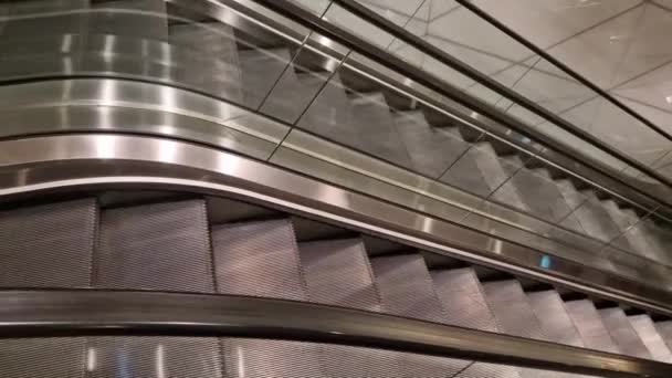 escalator and travelator service and adjustment. lubrication and regular review of the operation of the safety switches that stop machine in an emergency. when people fall, metal front view, stripes - Footage, Video