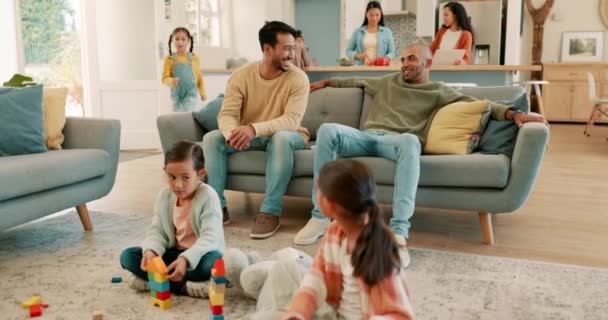 Family, living room and children play with toys for bonding, quality time and child development. Parents, siblings and happy kids learning with games, building blocks and relax on playdate at home. - Footage, Video