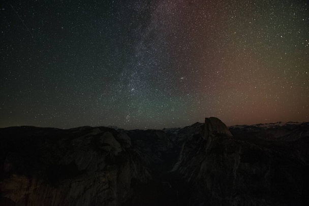 The Milky Way across the night sky in Yosemite Valley California, USA - Foto, Bild