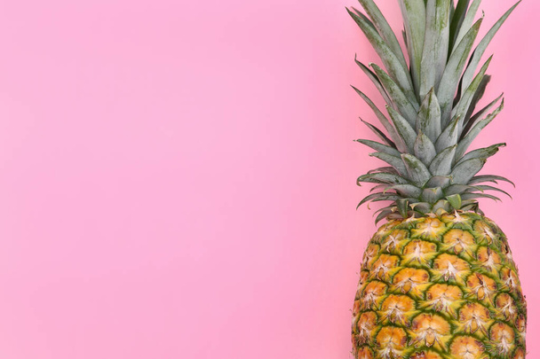 Delicious ripe pineapple on pink background, top view. Space for text - Foto, immagini