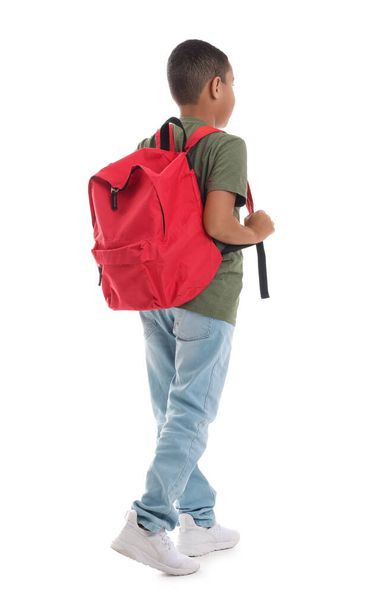 Little African-American schoolboy with backpack on white background - Fotografie, Obrázek