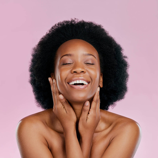 Funny, beauty and black woman with skincare, dermatology and makeup against a pink studio background. Female person, model and girl with happiness, cosmetics and humor with grooming, luxury and smile. - Fotó, kép