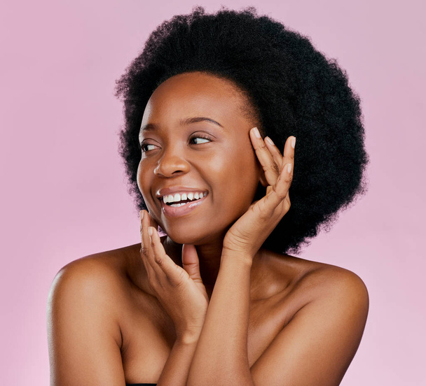 Afro, beauty or happy black girl thinking of dermatology, salon cosmetics or skincare in studio. Wellness, smile or face of African model with hair care or self love isolated on a pink background. - Zdjęcie, obraz