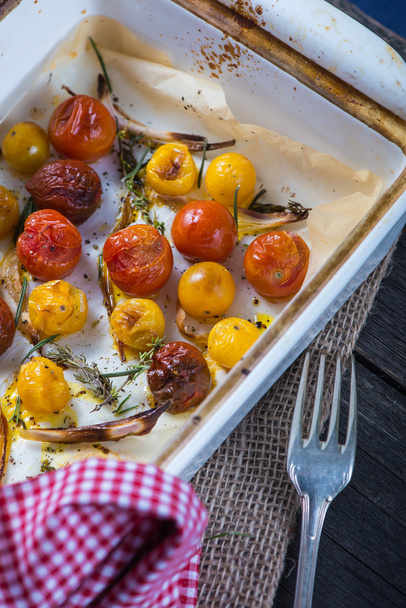 Roasted baby tomato with fresh herbs from above - Photo, Image