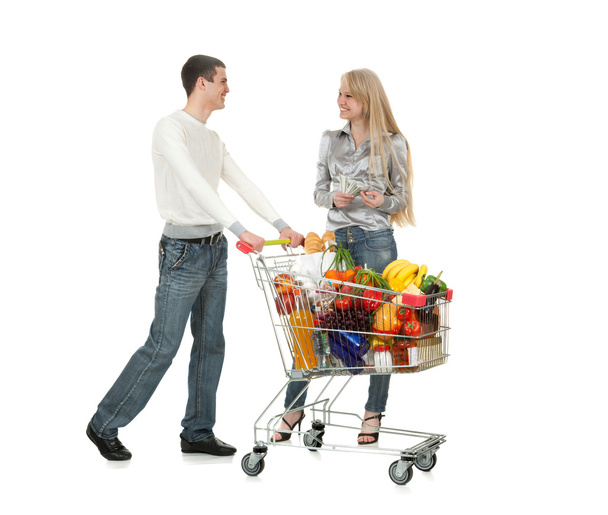 Young Couple And Shopping Trolley of Food - Fotó, kép