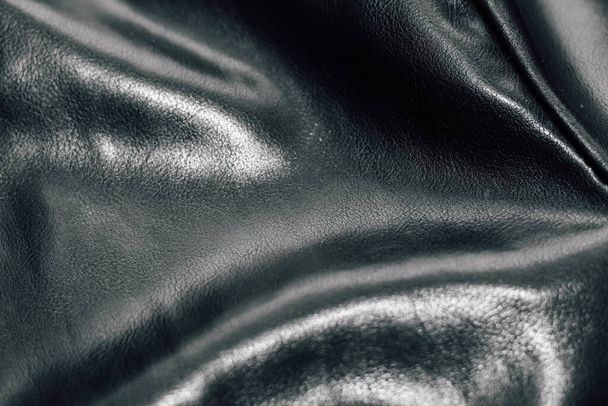 Chain on black texture eco soft leather, fashionable jacket. - Фото, зображення