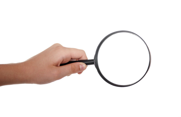 Hand with magnifying glass - Photo, Image