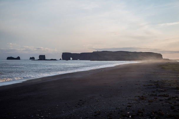 Basalt rock formations Troll toes on black beach. Reynisdrangar, Vik, Iceland - Foto, Imagen