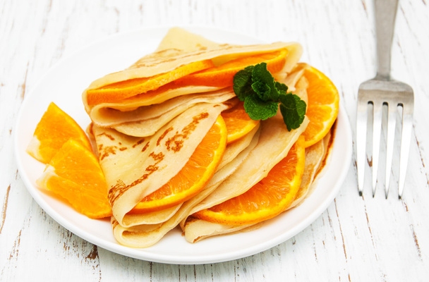 Pancakes with oranges - Photo, Image