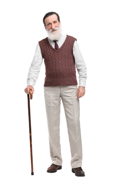Senior man with walking cane on white background - Foto, afbeelding