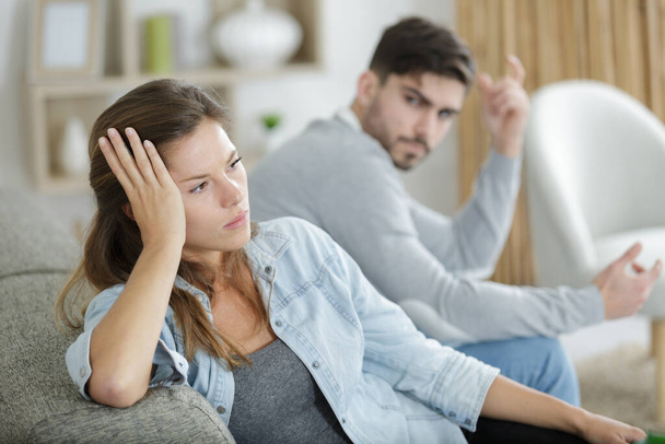 unhappy couple not talking after argument at home - Foto, Imagem