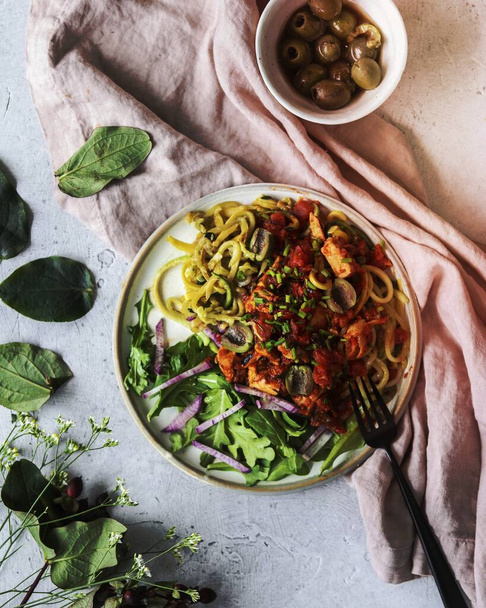 Plant based vegan spaghetti with olives - 写真・画像