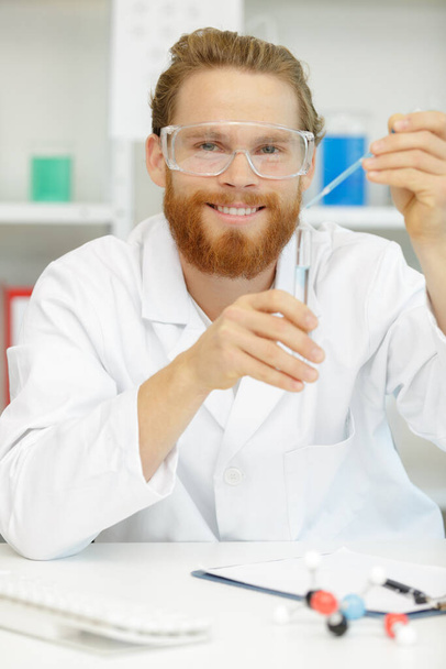 modern scientist working with pipette in biotechnology laboratory - 写真・画像