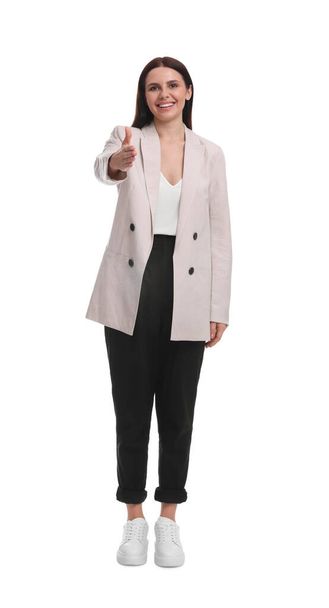 Beautiful young businesswoman in suit on white background - Photo, image