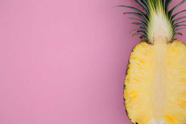 Half of ripe pineapple on pink background, top view. Space for text - Fotografie, Obrázek