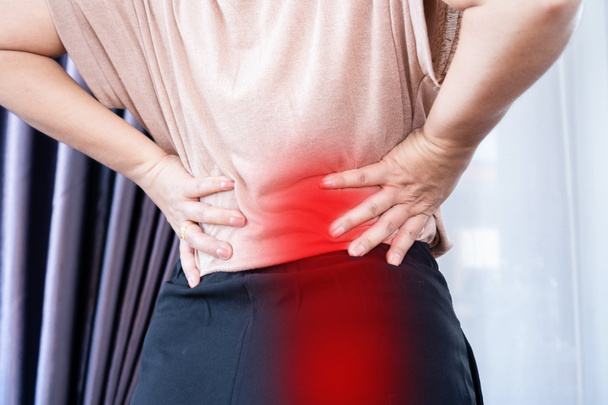 Frau mit Po und Rückenschmerzen, Ischiasschmerz-Konzept - Foto, Bild