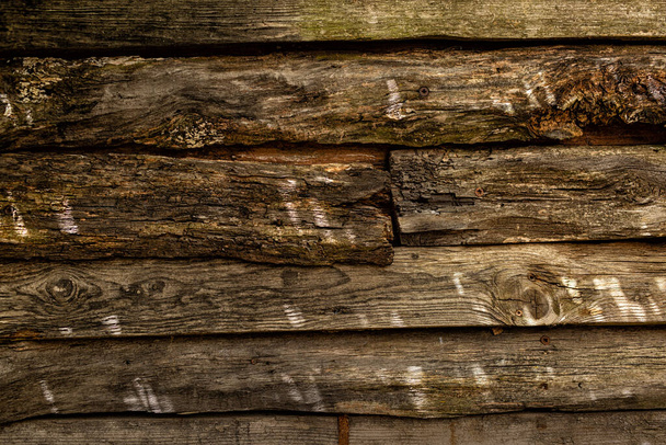 Wood texture background, aged wooden brown surface with lights spots, old fence. - Fotoğraf, Görsel