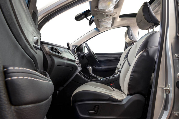 Steering wheel, shift lever, dashboard, speedometer display. Modern car interior - Φωτογραφία, εικόνα