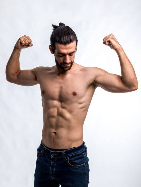 Fit and handsome man with beautiful torso. Strong and handsome ,fit and sporty bodybuilder man.  Man Fitness Model Torso showing six pack abs - Фото, зображення