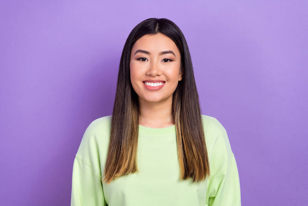 Photo of funky sweet lady wear green sweatshirt smiling showing white teeth isolated purple color background. - Photo, Image