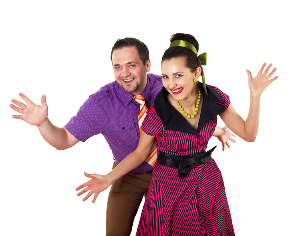 Young dancing couple in bright colour wear - Photo, image