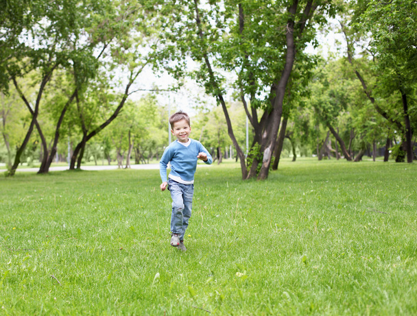 Portrait of a little boy outdoors - Foto, immagini