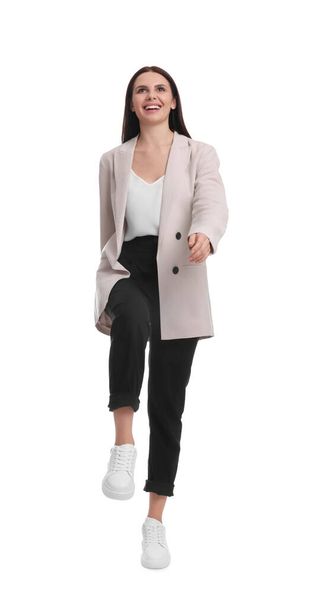Beautiful businesswoman in suit posing on white background - Zdjęcie, obraz