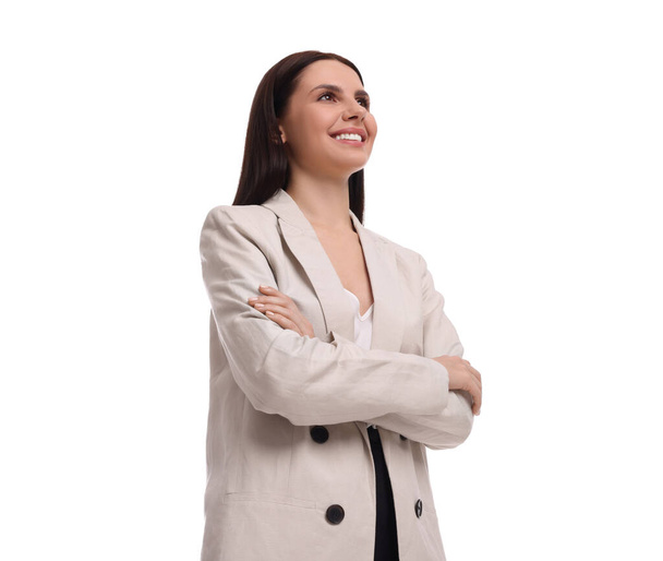 Beautiful businesswoman in suit on white background, low angle view - Φωτογραφία, εικόνα