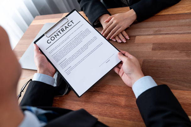 Businessman review agreement document before signing contract. Reading carefully to ensure trade deal align with business goals. Professionalism for business decision making concept. Jubilant - Photo, image